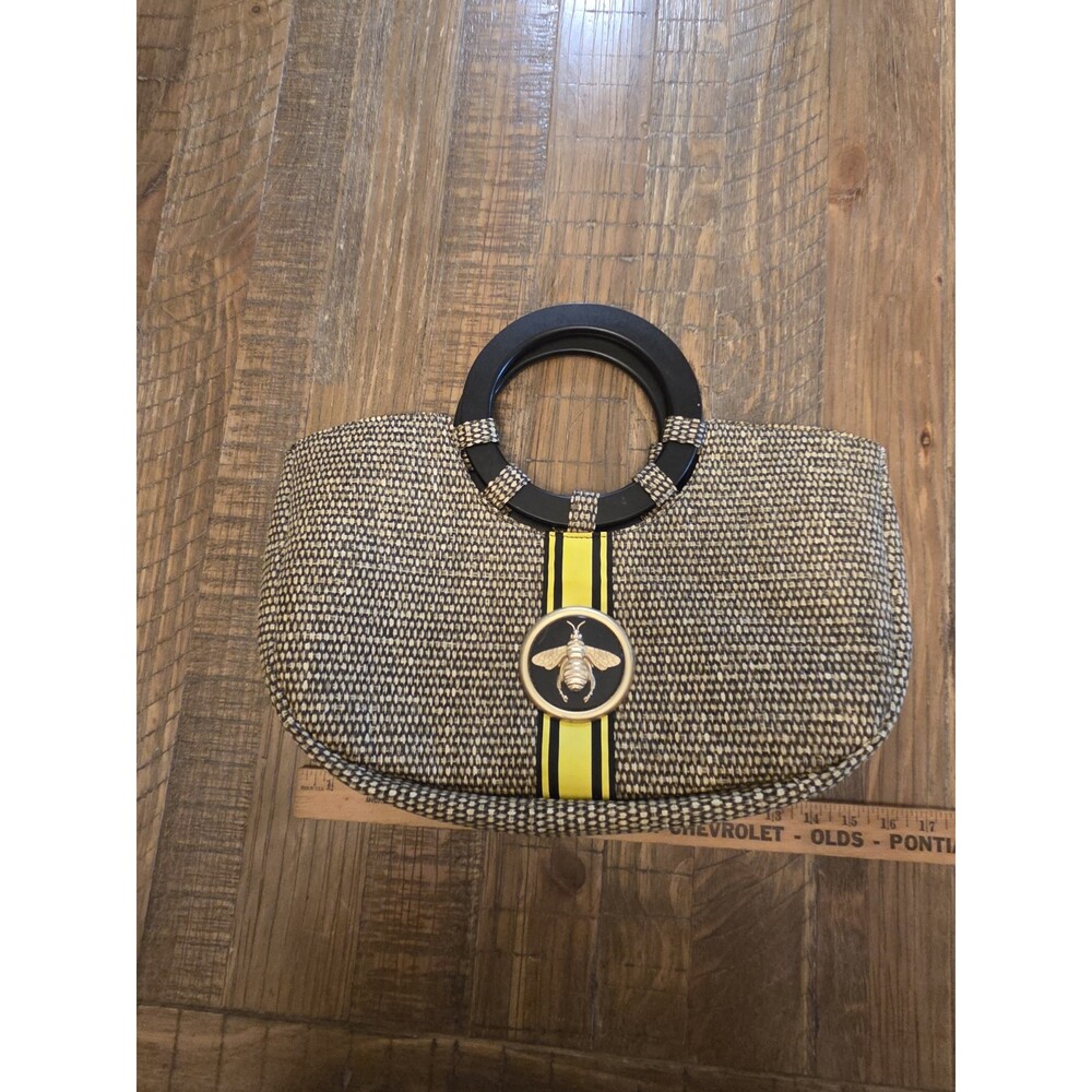 BRACIANO STRAW WOVEN PURSE  WOODEN HANDLES GOLD BEE MEDALLION